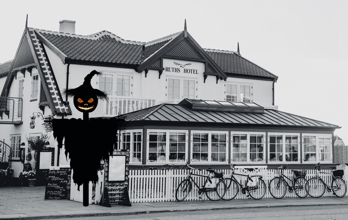 Ruths Hotel with a scarecrow in front 